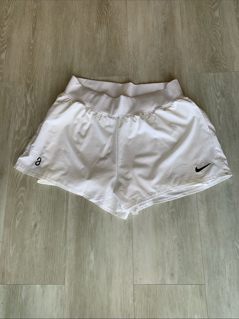 Nike Women's White Athletic Shorts with Black Swoosh Accent, Large